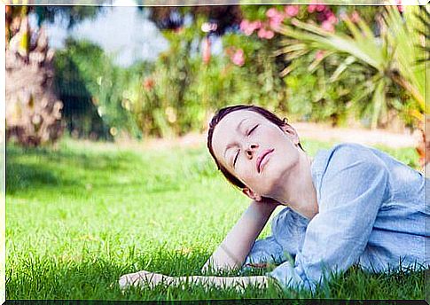 Woman lying on the grass