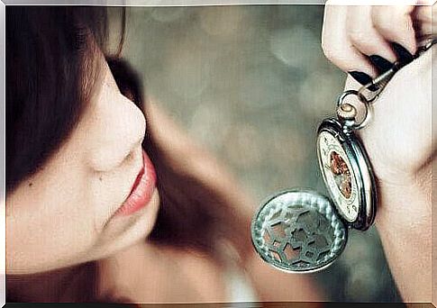 woman looking at the clock