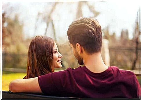 Couple on a park bench.