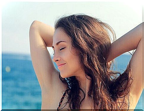 Happy woman on the beach