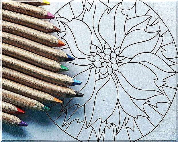 Mandala and wooden crayons