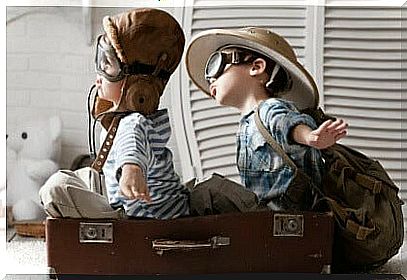 Children playing with an airplane