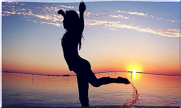 woman dancing in water