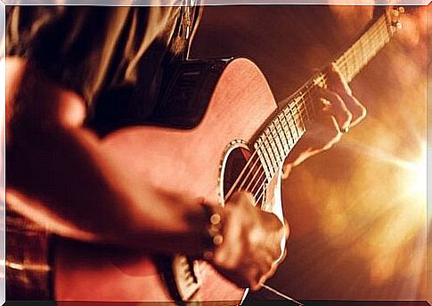 man playing guitar