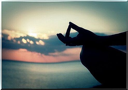 meditating on the beach