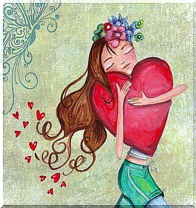 the girl hugs a big heart